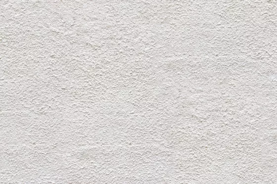 Abbildung einer Wand aus Gipsputze im Innenbereich als Hintergrund für Wandfliesen