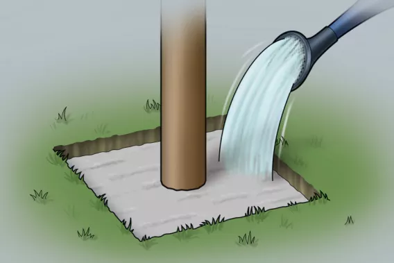Abbildung einer Gießkanne, die den Beton für den Pfosten mit Wasser benetzt
