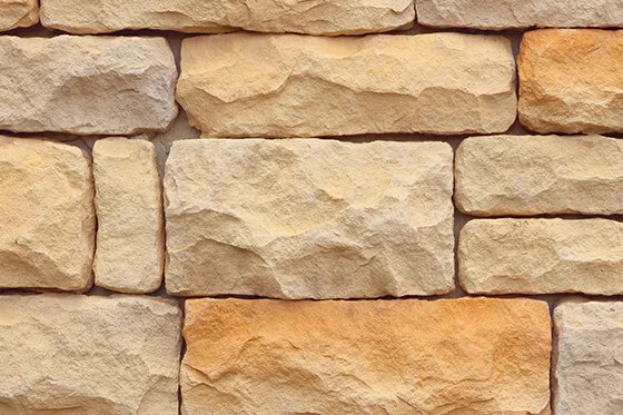 Abbildung einer Natursteinmauer aus Sandstein
