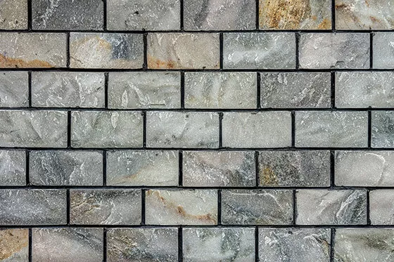 Abbildung einer Natursteinmauer aus Marmor