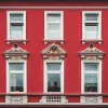 Ambientebild rote Altbaufassade - verarbeitet mit Mineralwolle-Lamelle von SAKRET